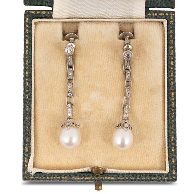 Lot 169 - A pair of early 20th Century pearl and diamond drop earrings