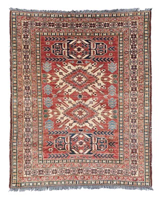 Lot 407 - An Afghan rug of Kazak design