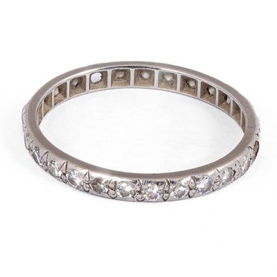 Lot 181 - A white metal and diamond eternity ring