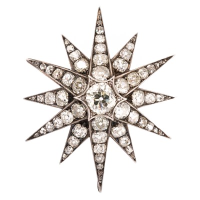 Lot 182 - A Victorian white metal diamond starburst brooch