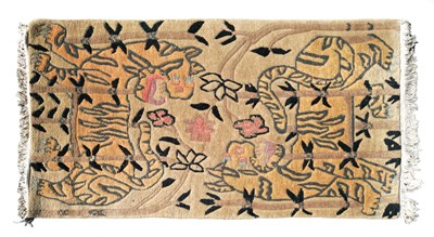 Lot 159 - A Tibetan tiger rug