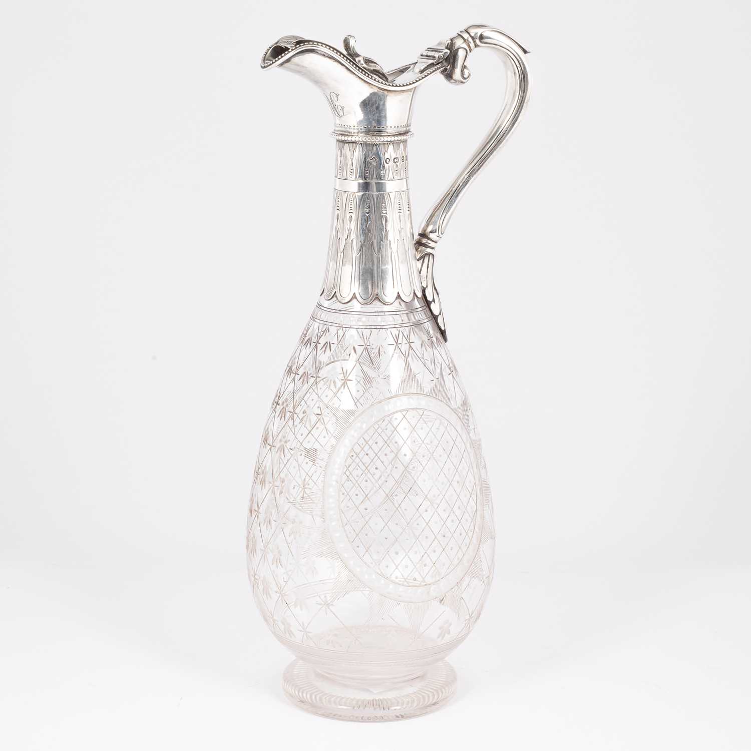 Lot 36 - A Victorian silver mounted claret jug