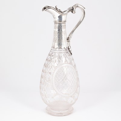 Lot 36 - A Victorian silver mounted claret jug