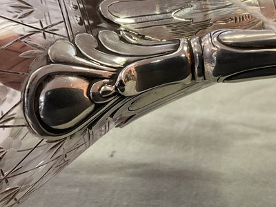 Lot 36 - A Victorian silver mounted claret jug