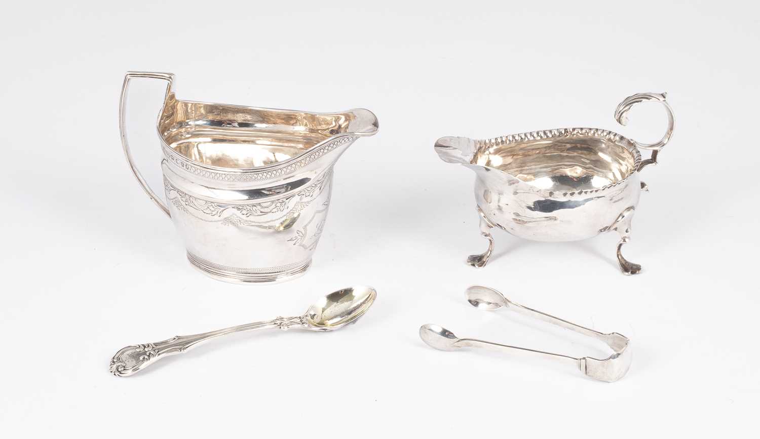Lot 40 - A George III silver cream jug