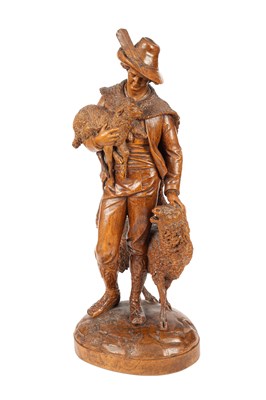 Lot 685 - A late 19th Century carved figure of a shepherd and sheep