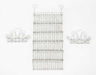 Lot 432 - Celestino Valenti, a large decorative wall hanging wirework rack