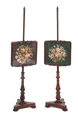 Lot 287 - A pair of William IV rosewood pole screens
