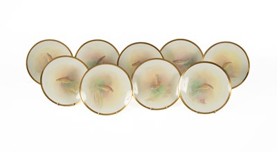 Lot 822 - Nine Minton bone china plates painted fish by J E Dean