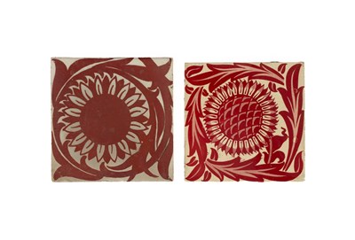Lot 834 - A De Morgan style red lustre tile decorated with a sunflower