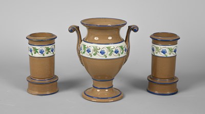 Lot 847 - A Spode buff ground garniture with border of blue flowers