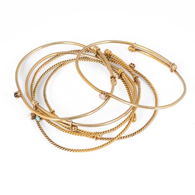 Lot 135 - Six gold bangles