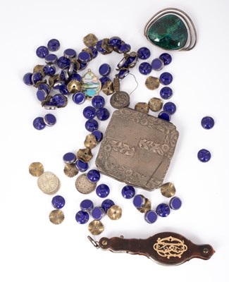 Lot 136 - A malachite and silver brooch