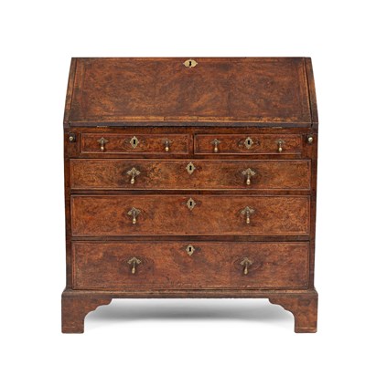 Lot 382 - A George II burr walnut and chevron banded bureau
