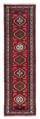 Lot 391 - An Afghan runner of Shirvan design