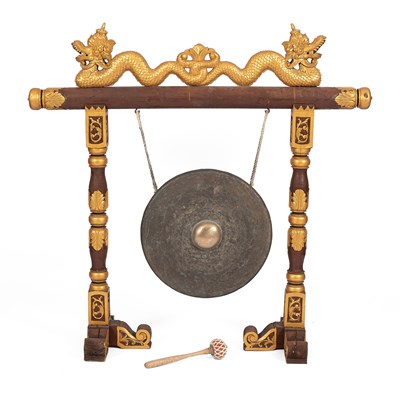 Lot 172 - A Balinese bronze gong with wooden stand