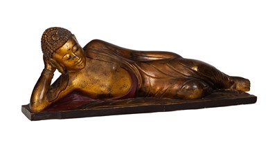 Lot 173 - A wooden gilt lacquer reclining buddha