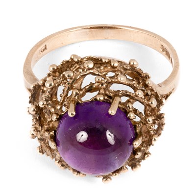 Lot 140 - A 1970's 9ct yellow gold and amethyst dress ring