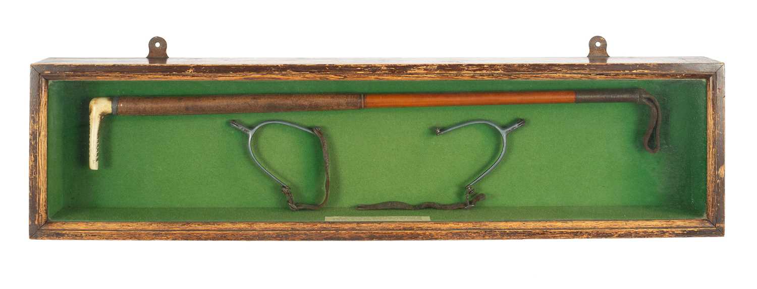 Lot 596 - John Peel interest: A cased riding crop and spurs
