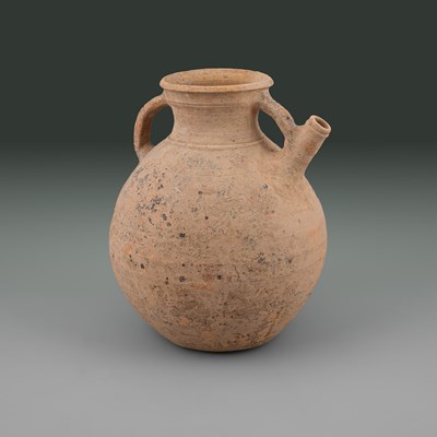 Lot 616 - A massive and ancient terracotta spouted amphora