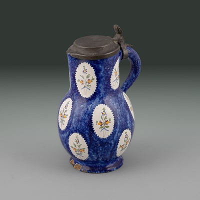 Lot 623 - A Brussels faience jug and cover