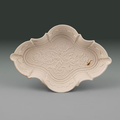 Lot 627 - A Staffordshire white saltglaze stoneware spoon tray