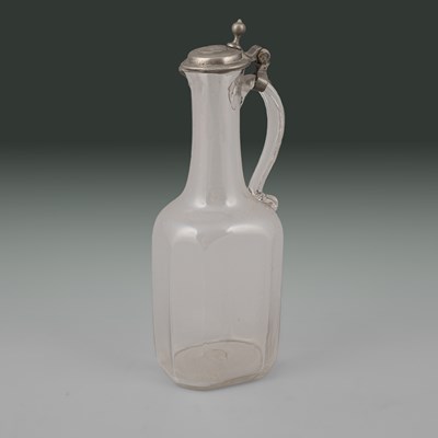 Lot 646 - A pewter-mounted glass serving bottle