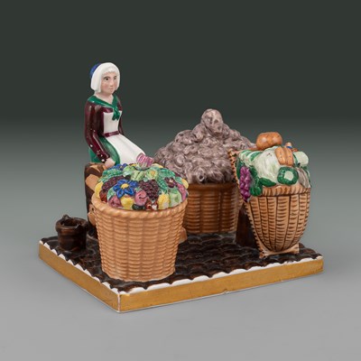 Lot 652 - A Paris porcelain figural match pot