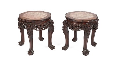 Lot 176 - A pair of Chinese vase stands