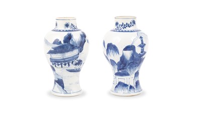 Lot 209 - A near pair of Chinese blue and white baluster vases