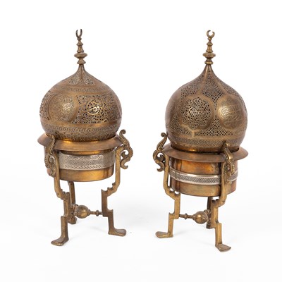 Lot 137 - A pair of Safavid style brass incense burners