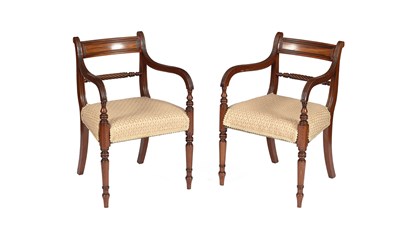 Lot 524 - A pair of Regency mahogany bar back open armchairs