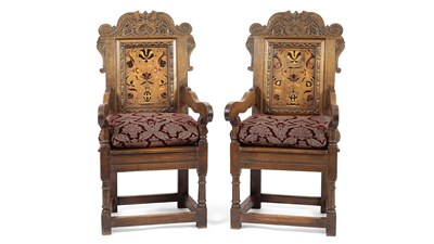 Lot 565 - A pair of carved 17th Century style wainscot chairs