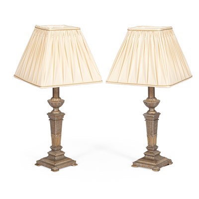 Lot 586 - A pair of Neoclassical style cast-aluminium table lamps