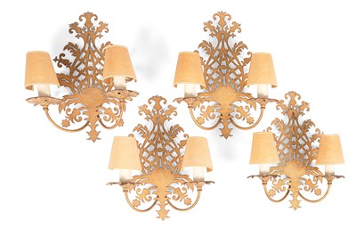 Lot 573 - A set of four two-branch wall lights