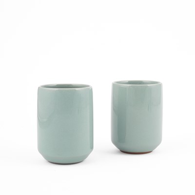 Lot 278 - Two celadon porcelain cups by Suwa Sozan III