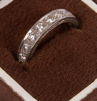 Lot 96 - An 18ct white gold and diamond half eternity ring